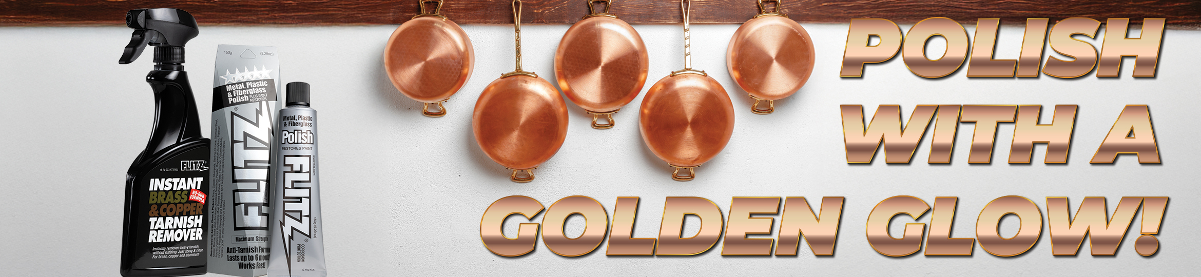 Copper pots and pans hang from a wooden pot rack next to bottles of Flitz tarnish remover and polish paste. Text across the image says, "polish with a golden glow"